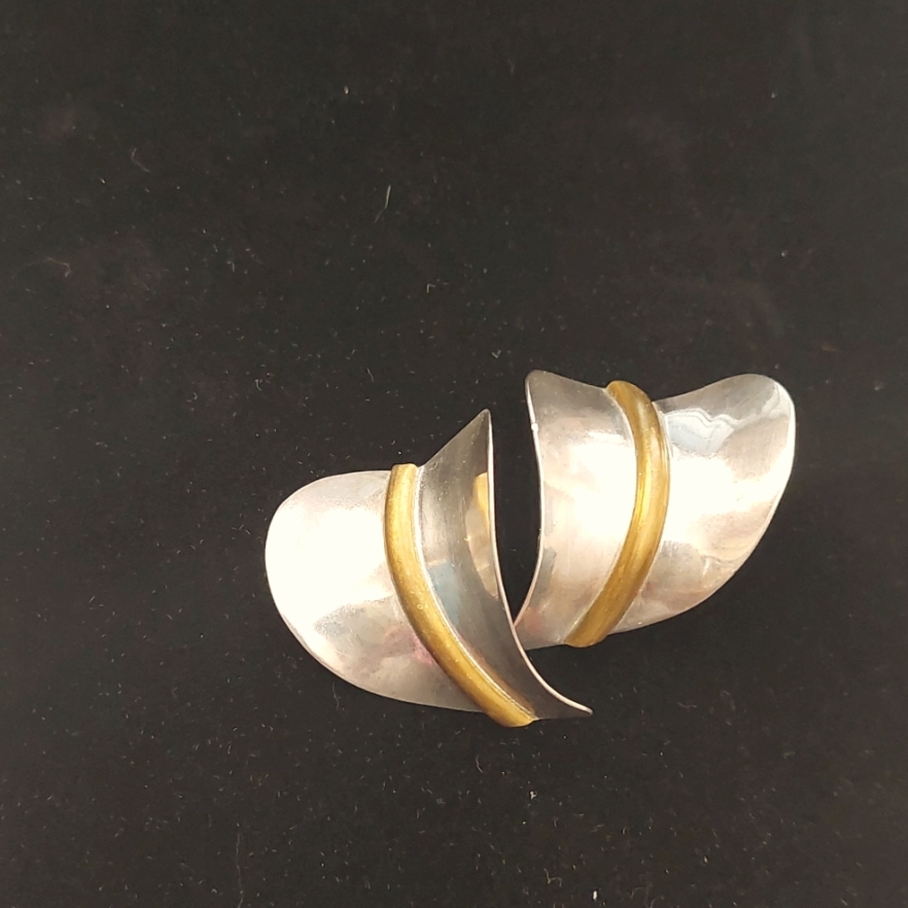 Earrings handcrafted in Mexico.   14 gr Silver & brass artsy hearts with posts.